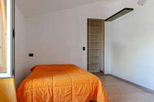 A bed or beds in a room at Villa Regno di Toscana