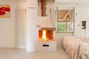A bed or beds in a room at Villa Regno di Toscana