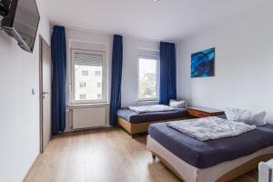 Postel nebo postele na pokoji v ubytování Pension für Monteure in Leipzig