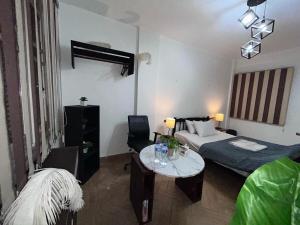 Postel nebo postele na pokoji v ubytování Niche Room Near To Airport, Nasr City