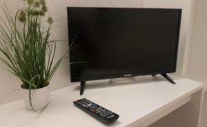 TV a/nebo společenská místnost v ubytování Central-Hotel Tegel