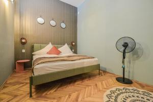 Postel nebo postele na pokoji v ubytování Celebration Flat by Ruterra