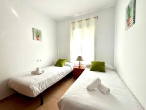 Posteľ alebo postele v izbe v ubytovaní Mirador de Doñana Nº8, Apartamentos Living Sur