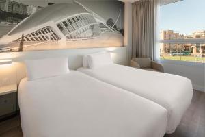 Postel nebo postele na pokoji v ubytování B&B HOTEL Valencia Ciudad de las Ciencias + 33 fotografií