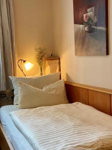 Llit o llits en una habitació de Stefans Gästezimmer 3 fotos més