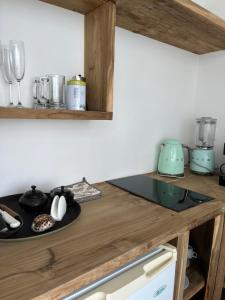 Η κουζίνα ή μικρή κουζίνα στο Amani Home - Mbili Junior Suite