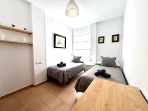 Postel nebo postele na pokoji v ubytování Mirador de Doñana Nº 7, Apartamentos Living Sur