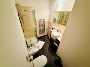 Koupelna v ubytování TURATI ROOMs