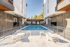 Фотография из галереи Lüks 1plus1 Residence DaireTaban Isıtma, Klima, WiFi в Анталье