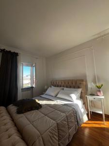 Postel nebo postele na pokoji v ubytování B&B MareLuna