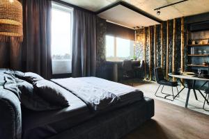 Postel nebo postele na pokoji v ubytování VIP Studio MANHATTAN City, Prospect Beresteiskyi 11