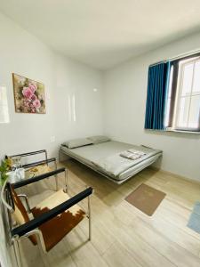 Postel nebo postele na pokoji v ubytování Thong Dong Homestay