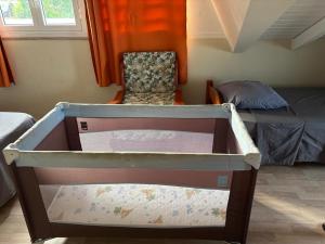 Postel nebo postele na pokoji v ubytování Nuits étoilés