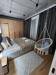 Postel nebo postele na pokoji v ubytování New Gudauri Apartments in Twins