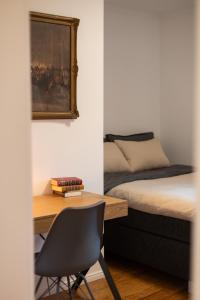 Giường trong phòng chung tại Mokka Suite Design in Neumünster