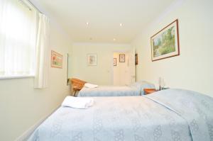 Ένα ή περισσότερα κρεβάτια σε δωμάτιο στο Shanklin Stunning Sea Views