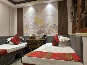 Pingyao HongJingYuanGuesthouse客房内的一张或多张床位