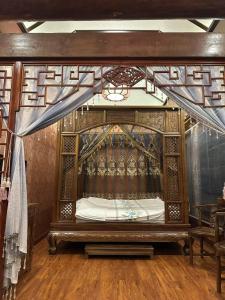 Pingyao HongJingYuanGuesthouse客房内的一张或多张床位