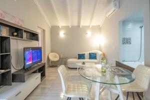 A television and/or entertainment centre at LUXURY JUST FOR 2