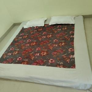 Katil atau katil-katil dalam bilik di Venkateswara Homestay