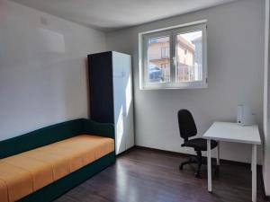 Ένα ή περισσότερα κρεβάτια σε δωμάτιο στο Sudent Rooms