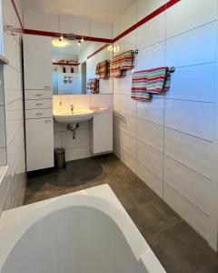 Koupelna v ubytování Ferienwohnung Flynn + 37 fotografií
