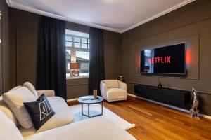 TV/trung tâm giải trí tại Mokka Suite Design in Neumünster