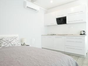 Postel nebo postele na pokoji v ubytování Apartmán Laura