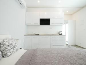 Postel nebo postele na pokoji v ubytování Apartmán Laura