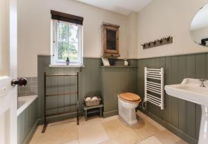 Koupelna v ubytování New Brachkashie Cottage + 33 fotografií