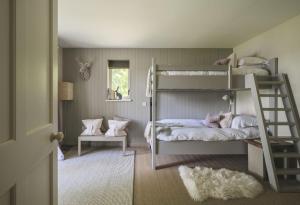 Postel nebo postele na pokoji v ubytování New Brachkashie Cottage