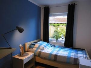 Postel nebo postele na pokoji v ubytování Nordwind