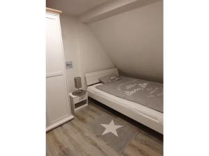 Postel nebo postele na pokoji v ubytování Nordwind