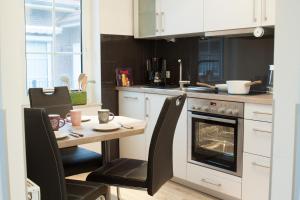 Dapur atau dapur kecil di Ferienhaus Küstenzeit