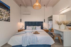 Postel nebo postele na pokoji v ubytování AKEA VILLAS + 37 fotografií