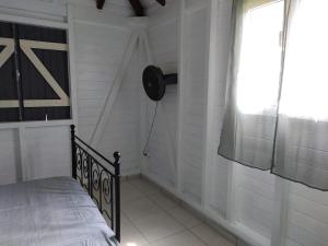 Postel nebo postele na pokoji v ubytování Bungalow An ka