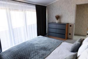 Ліжко або ліжка в номері Котеджі Альціона