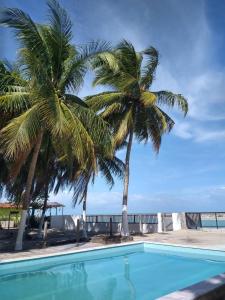 Bazén v ubytování RS1- casa andar superior para até 8 pessoas praia do sossego itamaracá PE nebo v jeho okolí