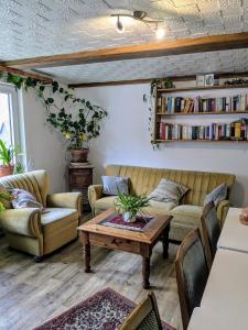 Posezení v ubytování Wohnung am Waldrand