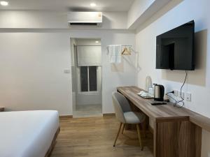 Μια τηλεόραση ή/και κέντρο ψυχαγωγίας στο VELA Korat Hotel & Cafe'