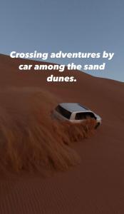 assing experiences by car among the sand dunes at Desert camping trips by car in Al Wāşil