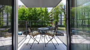 Balkón alebo terasa v ubytovaní Apartamenty Sun & Snow Rakowicka Steam Park