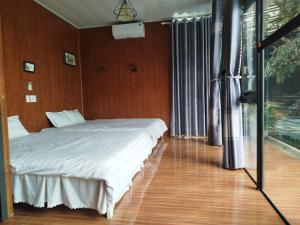 Giường trong phòng chung tại Daisy Homestay Tam Đảo +1 ảnh