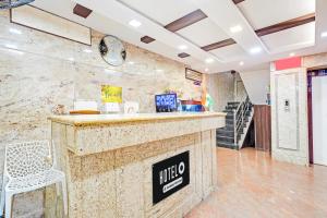 Kuchyň nebo kuchyňský kout v ubytování Super Hotel O Triplicane formerly Park Royal