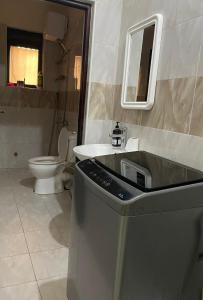 Ένα μπάνιο στο Evolve Estates, Apartment I