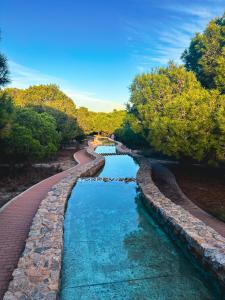 a river with a bridge in the middle at Apartament z widokiem na morze 250 m od plaży in Torrevieja