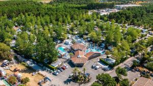 an overhead view of a park with a pool at Camping Le Domaine de la Marina in Messanges