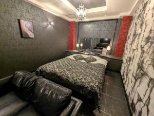 Postel nebo postele na pokoji v ubytování ホテルサバナリゾートＡｄｕｌｔ Ｏｎｌｙ