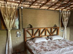 Postel nebo postele na pokoji v ubytování Narmada Homestay