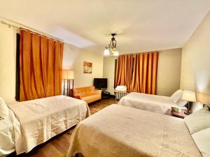 Katil atau katil-katil dalam bilik di MOTEL House +8 gambar
